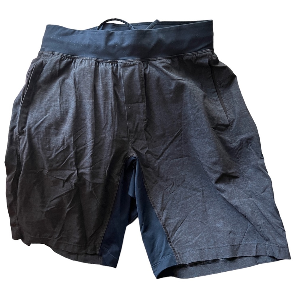 Men’s navy blue, no liner, athletic shorts, size small.